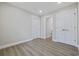 Spacious bedroom with wood-look flooring and ample closet space at 409 2Nd Ave. S, Myrtle Beach, SC 29577