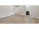 Bedroom showcasing wood-look floors, neutral paint, doorways and a glimpse of the bathroom at 409 2Nd Ave. S, Myrtle Beach, SC 29577