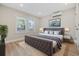 Cozy bedroom featuring a large bed and modern decor at 409 2Nd Ave. S, Myrtle Beach, SC 29577