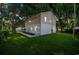Charming two-story home with a well-maintained lawn and mature trees surrounding the property at 409 2Nd Ave. S, Myrtle Beach, SC 29577