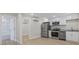 Modern kitchen with stainless steel appliances and white cabinets at 409 2Nd Ave. S, Myrtle Beach, SC 29577