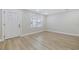 Bright living room with a front door and a large window at 409 2Nd Ave. S, Myrtle Beach, SC 29577