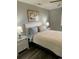 Bright bedroom with natural light, complemented by a queen bed and stylish nightstands at 4107 Pinehurst Circle # Dd-15, Little River, SC 29566