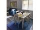 Cozy dining area with a table and seating for four at 4107 Pinehurst Circle # Dd-15, Little River, SC 29566