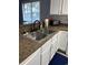 Open kitchen layout with countertop sink and modern faucet at 4107 Pinehurst Circle # Dd-15, Little River, SC 29566