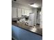 Bright kitchen with a functional layout and countertop dining at 4107 Pinehurst Circle # Dd-15, Little River, SC 29566