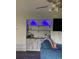 Stylish living room featuring custom built-in bar with blue lighting and a comfortable seating area at 4107 Pinehurst Circle # Dd-15, Little River, SC 29566