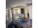Open concept living space featuring dining area, kitchen and access to bedroom at 4107 Pinehurst Circle # Dd-15, Little River, SC 29566