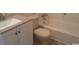 Bathroom featuring white vanity and toilet near a well-maintained bathtub at 411 Cambridge Circle # D5, Murrells Inlet, SC 29576