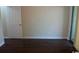 Living area featuring hardwood floors, door and sliding glass door with curtains at 411 Cambridge Circle # D5, Murrells Inlet, SC 29576