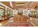 Open-concept living area featuring vaulted ceilings, fireplace, and lots of natural light at 4131 Gunter Lake Rd., Galivants Ferry, SC 29544