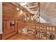Loft with wooden beams overlooking the living area at 4131 Gunter Lake Rd., Galivants Ferry, SC 29544