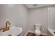 Full bathroom with white vanity, toilet, and tub/shower combination at 4145 Highway 308, Galivants Ferry, SC 29544
