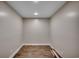 Empty room with wood-look flooring, ready to be transformed into your dream space at 4145 Highway 308, Galivants Ferry, SC 29544