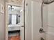 Shower stall and view into the bedroom in this ensuite bathroom at 4251 Hibiscus Dr. # 202, Little River, SC 29566