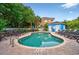 Community pool area with several lounge chairs for residents to enjoy the sun at 4251 Hibiscus Dr. # 202, Little River, SC 29566