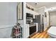 Well-lit kitchen features stainless steel appliances, light countertops, and ample storage at 4251 Hibiscus Dr. # 202, Little River, SC 29566