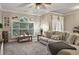 Comfortable living room features a large window for natural light and a plush sofa for relaxation at 4251 Hibiscus Dr. # 202, Little River, SC 29566