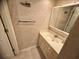 Vanity and sink in a comfortable bathroom with tile flooring and decorated walls at 4430 Eastport Blvd. # L-11, Little River, SC 29566