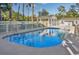 Sparkling community pool with clear blue water and well-maintained surrounding area at 4430 Eastport Blvd. # L-11, Little River, SC 29566