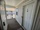 Inviting condo entrance with a view of the building's exterior and well-maintained surroundings at 4430 Eastport Blvd. # L-11, Little River, SC 29566