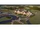 Stunning aerial view of the golf course and clubhouse with red door accents, perfect for luxury living at 4430-G Montrose Ln. # G, Myrtle Beach, SC 29579