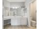 Bathroom with double vanity, tiled floor, and good light at 4430-G Montrose Ln. # G, Myrtle Beach, SC 29579