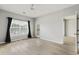 Light and airy bedroom featuring a ceiling fan, window, and outdoor access at 4430-G Montrose Ln. # G, Myrtle Beach, SC 29579