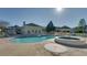 Community pool with surrounding lounge area, pergola, and lush landscaping at 4430-G Montrose Ln. # G, Myrtle Beach, SC 29579