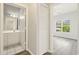 Hallway view of the bathroom and bedroom, with gray walls and white trim at 4430-G Montrose Ln. # G, Myrtle Beach, SC 29579