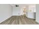 View of the living room with a ceiling fan, light grey walls, and wood floors at 4430-G Montrose Ln. # G, Myrtle Beach, SC 29579