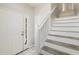 Entryway staircase with white railing at 4430-G Montrose Ln. # G, Myrtle Beach, SC 29579