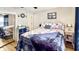 Inviting bedroom with nautical-themed decor, mirrored closet, and ample natural light at 4477 Little River Inn Ln. # 1802, Little River, SC 29566