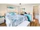 Inviting bedroom with coastal decor and an ensuite bathroom at 4477 Little River Inn Ln. # 1802, Little River, SC 29566