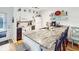 Charming kitchen featuring a large island with a granite countertop and seating at 4477 Little River Inn Ln. # 1802, Little River, SC 29566