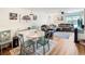 Open-concept living room with modern furnishings and light wood flooring, creating a bright and inviting space at 4477 Little River Inn Ln. # 1802, Little River, SC 29566