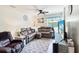 Comfortable living room with plush seating, a ceiling fan, and serene decor at 4477 Little River Inn Ln. # 1802, Little River, SC 29566