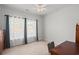 Sun-filled bedroom with large windows and neutral decor, creating a relaxing atmosphere at 450 Oaklanding Ln., Murrells Inlet, SC 29576