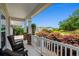 Inviting front porch with comfortable seating and attractive landscaping at 450 Oaklanding Ln., Murrells Inlet, SC 29576