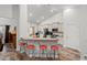 Eat-in kitchen features a breakfast bar with seating, granite countertops and stainless steel appliances at 450 Oaklanding Ln., Murrells Inlet, SC 29576