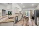 Bright kitchen with granite countertops, stainless steel dishwasher, and eat in dining area at 450 Oaklanding Ln., Murrells Inlet, SC 29576