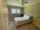 Well-lit bedroom featuring a window, bed, and neutral wall paint at 4637 Dogwood St., Loris, SC 29569