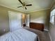 Bright bedroom with a window, closet, and a dresser for storage solutions at 4637 Dogwood St., Loris, SC 29569