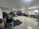 Garage with epoxy floor, storage, workbench and overhead lighting at 4637 Dogwood St., Loris, SC 29569