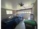 Spacious garage with a blue sports car, window and a garage door at 4637 Dogwood St., Loris, SC 29569