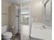 Bathroom with a vanity and mirror and an opened doorway to a bedroom at 4924 Pond Shoals Ct. # 201, Myrtle Beach, SC 29579
