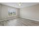 Bright bedroom with two windows allowing for ample natural light to fill the space at 4924 Pond Shoals Ct. # 201, Myrtle Beach, SC 29579