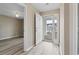 Bright foyer with light wood floors, an open door, and neutral paint at 4924 Pond Shoals Ct. # 201, Myrtle Beach, SC 29579