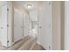 Hallway with hard surface floors, neutral paint and a view to another room at 4924 Pond Shoals Ct. # 201, Myrtle Beach, SC 29579