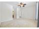 Expansive main bedroom with neutral carpeting and a ceiling fan at 50 Turning Stone Blvd. # 7, Murrells Inlet, SC 29576